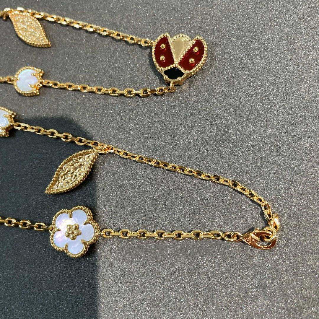 ˇGilded EraˇLUCKY SPRING 15 MOTIFS GOLD NECKLACE