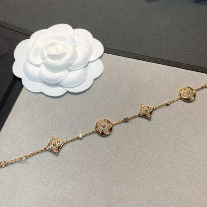 ˇGilded EraˇSTAR AND SUN 4 MOTIFS GOLD DIAMONDS BRACELET