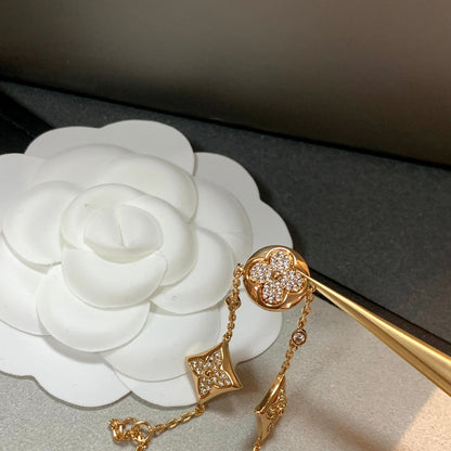 ˇGilded EraˇSTAR AND SUN 4 MOTIFS GOLD DIAMONDS BRACELET