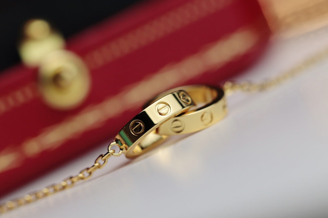 ˇGilded EraˇLOVE NECKLACE DOUBLE RING GOLD