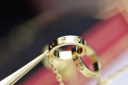 ˇGilded EraˇLOVE NECKLACE DOUBLE RING GOLD