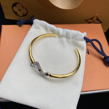 ˇGilded EraˇVOLTE UPSITE DOWN DIAMOND GOLD OPEN BRACELET