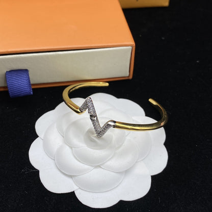 ˇGilded EraˇVOLTE UPSITE DOWN DIAMOND GOLD OPEN BRACELET