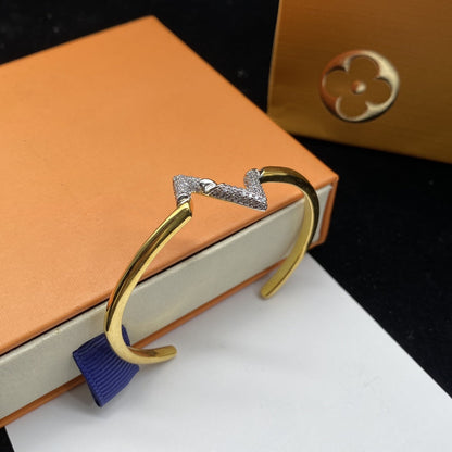 ˇGilded EraˇVOLTE UPSITE DOWN DIAMOND GOLD OPEN BRACELET