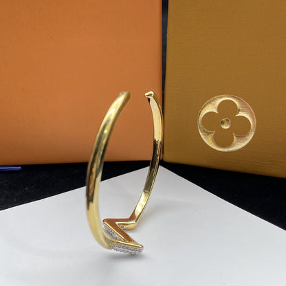 ˇGilded EraˇVOLTE UPSITE DOWN DIAMOND GOLD OPEN BRACELET