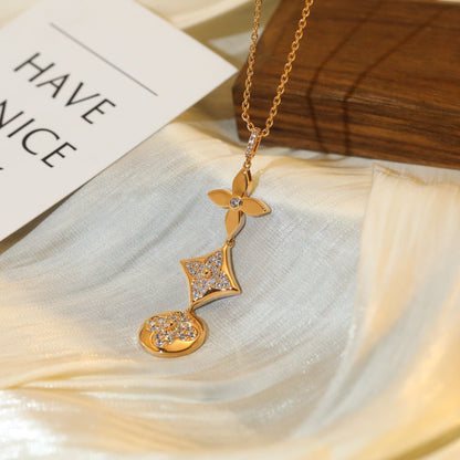 ˇGilded EraˇSTAR AND SUN DIAMOND PINK GOLD NECKLACE