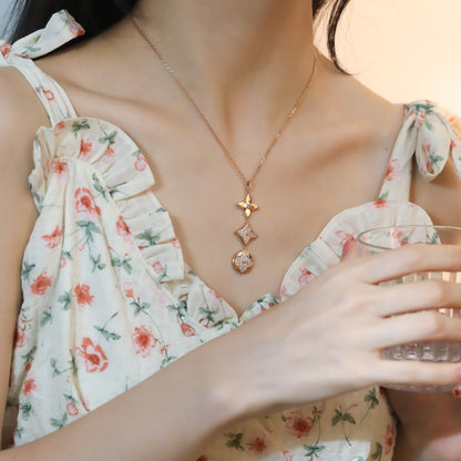 ˇGilded EraˇSTAR AND SUN DIAMOND PINK GOLD NECKLACE