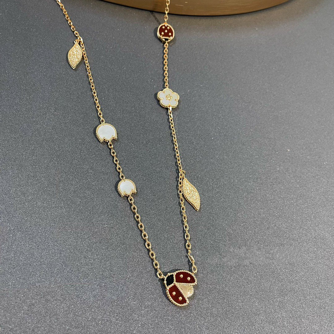 ˇGilded EraˇLUCKY SPRING 15 MOTIFS GOLD NECKLACE
