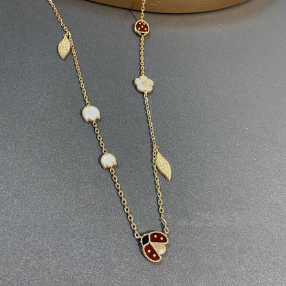 ˇGilded EraˇLUCKY SPRING 15 MOTIFS GOLD NECKLACE