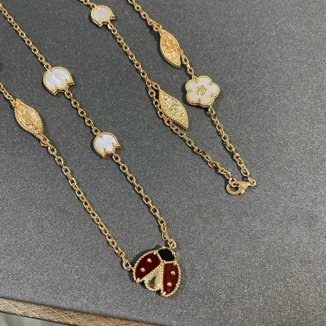 ˇGilded EraˇLUCKY SPRING 15 MOTIFS GOLD NECKLACE