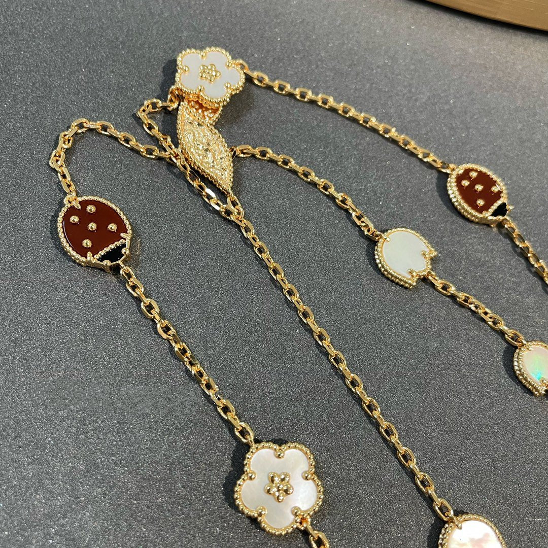 ˇGilded EraˇLUCKY SPRING 15 MOTIFS GOLD NECKLACE
