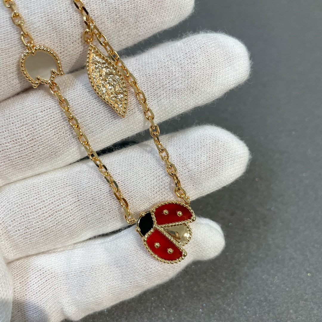 ˇGilded EraˇLUCKY SPRING 15 MOTIFS GOLD NECKLACE