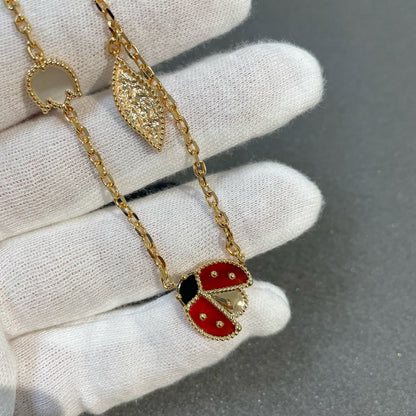 ˇGilded EraˇLUCKY SPRING 15 MOTIFS GOLD NECKLACE