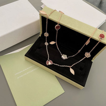 ˇGilded EraˇLUCKY SPRING 15 MOTIFS ROSE GOLD NECKLACE