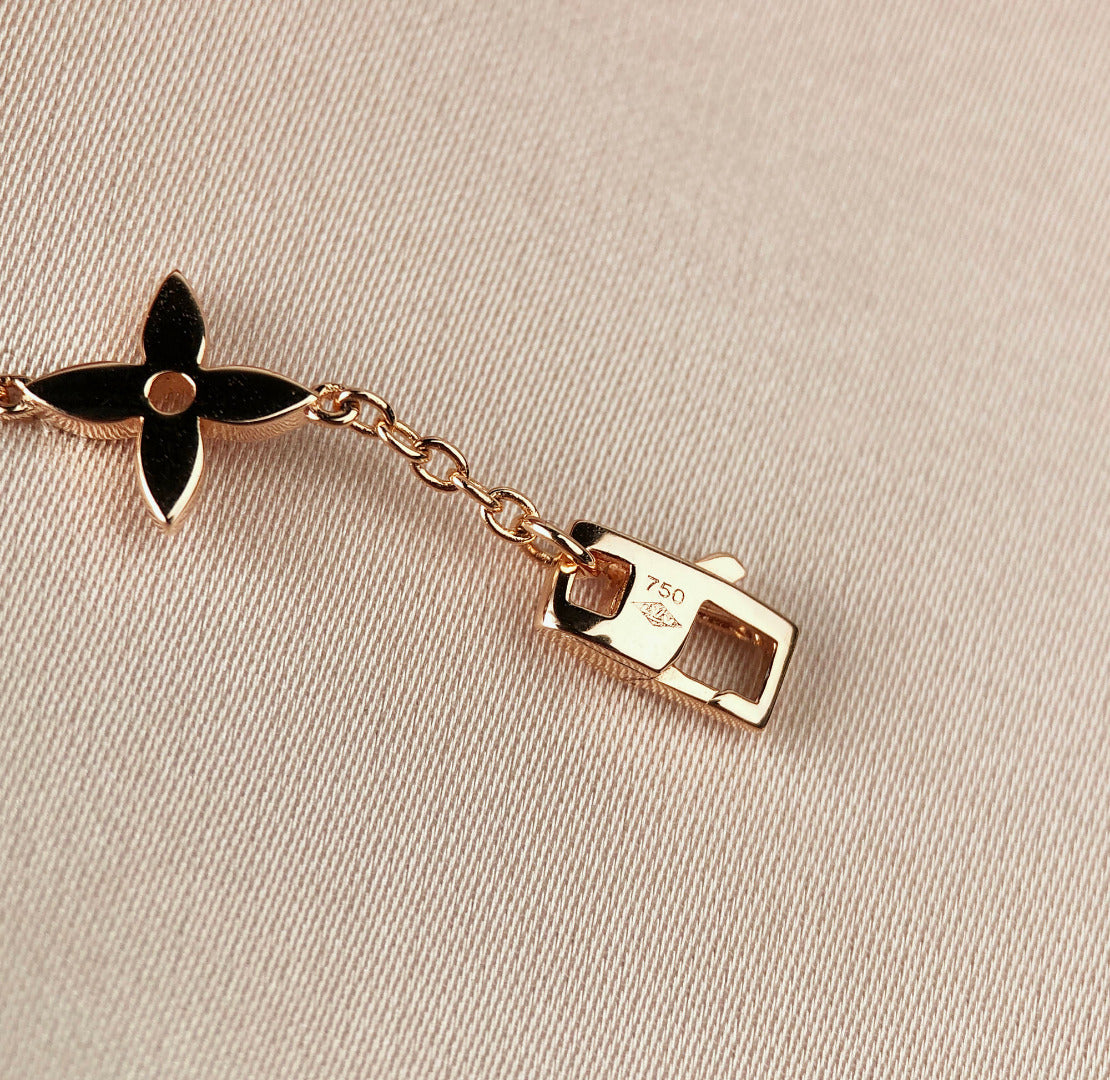 ˇGilded EraˇSTAR AND SUN 7 MOTIFS GOLD BRACELET