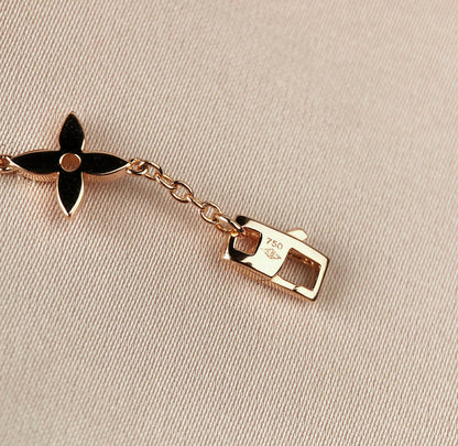 ˇGilded EraˇSTAR AND SUN 7 MOTIFS GOLD BRACELET