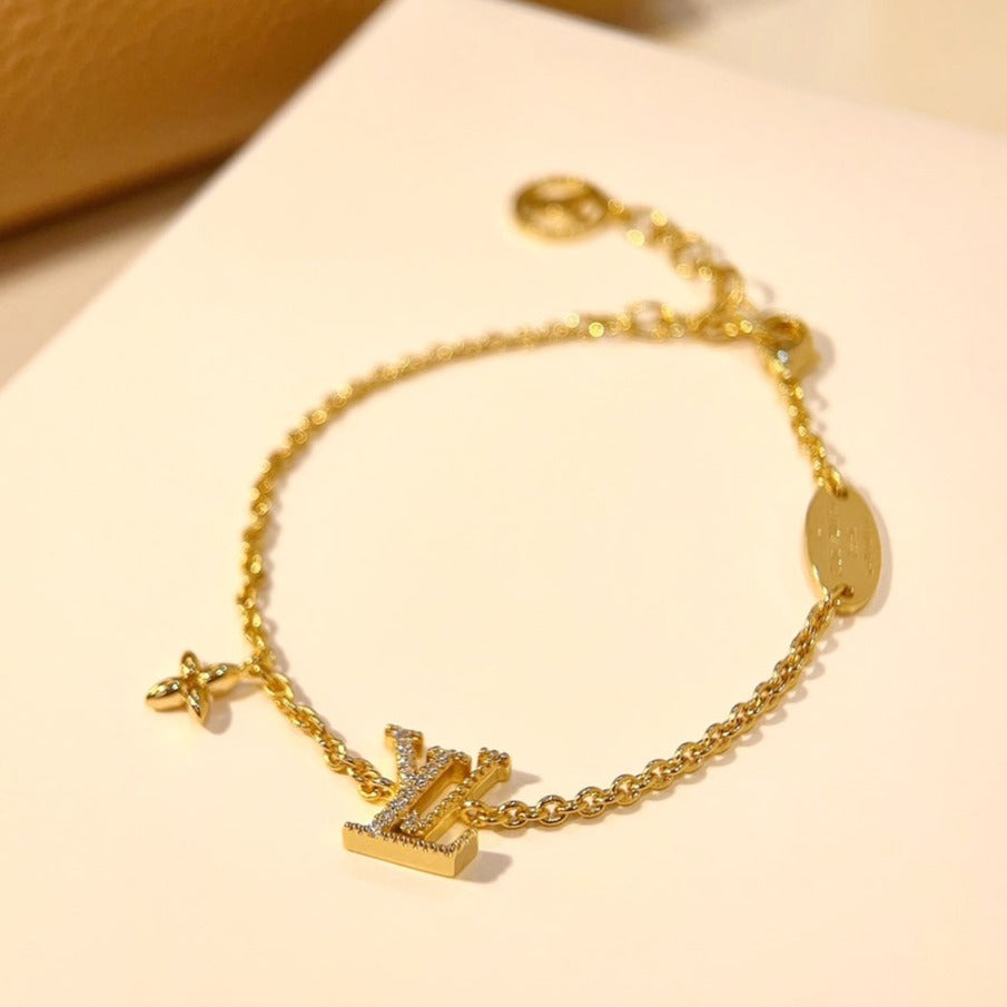 ˇGilded EraˇLOGO STAR MOTIF GOLD BRACELET