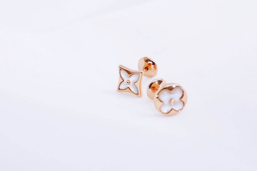 ˇGilded EraˇSTAR AND SUN PINK GOLD MOP STUD EARRINGS