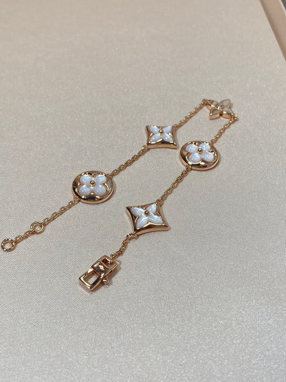 ˇGilded EraˇSTAR AND SUN 5 MOTIF MOP PINK GOLD BRACELET