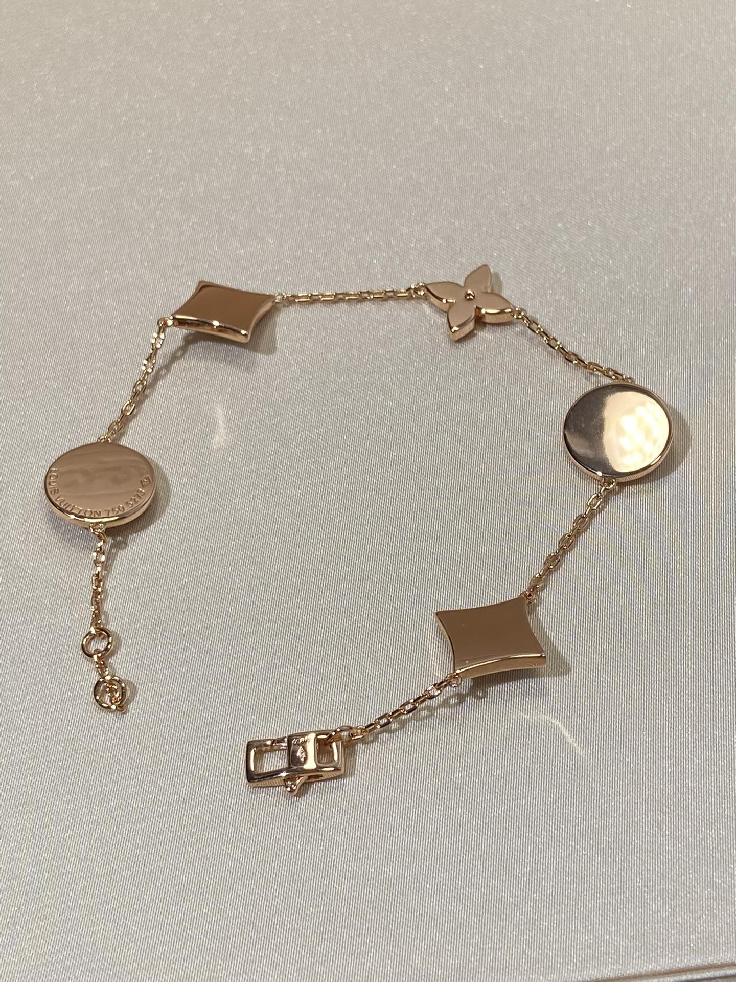 ˇGilded EraˇSTAR AND SUN 5 MOTIF MOP PINK GOLD BRACELET
