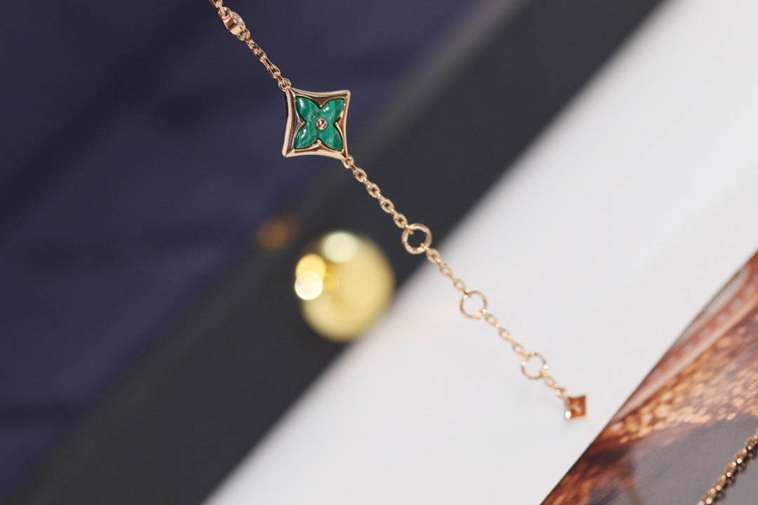 ˇGilded EraˇSTAR AND SUN 4 MOTIF PINK GOLD MALACHITE BRACELET
