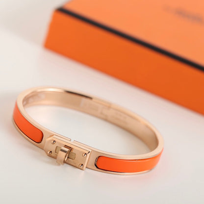 ˇGilded EraˇHM KELLY ORANGE BRACELET