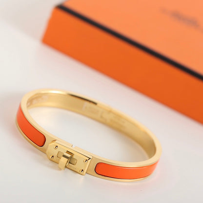 ˇGilded EraˇHM KELLY ORANGE BRACELET