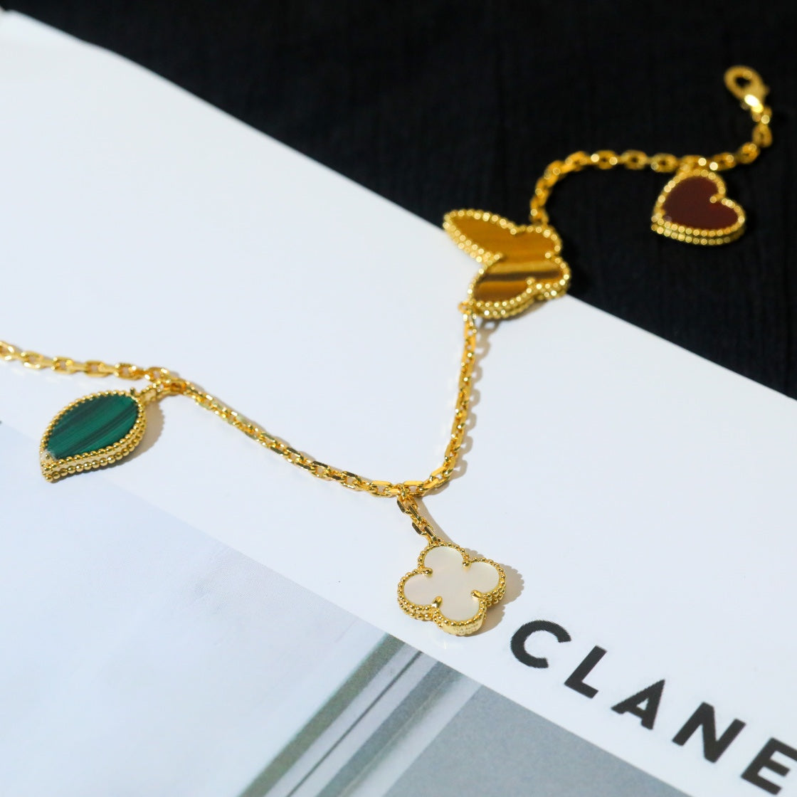 ˇGilded EraˇLUCKY SPRING 5 MOTIF GOLD BRACELET