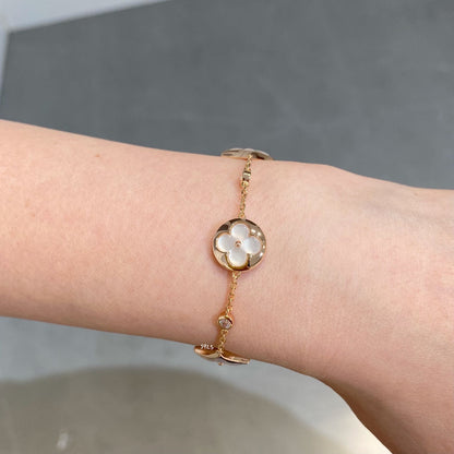 ˇGilded EraˇSTAR AND SUN 4 MOTIF WHITE MOP PINK GOLD BRACELET