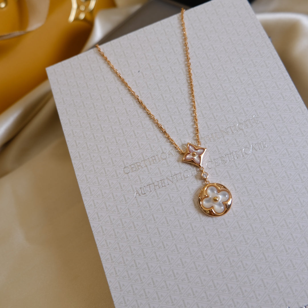 ˇGilded EraˇSTAR AND SUN WHITE MOP 2 MOTIF PINK GOLD NECKLACE