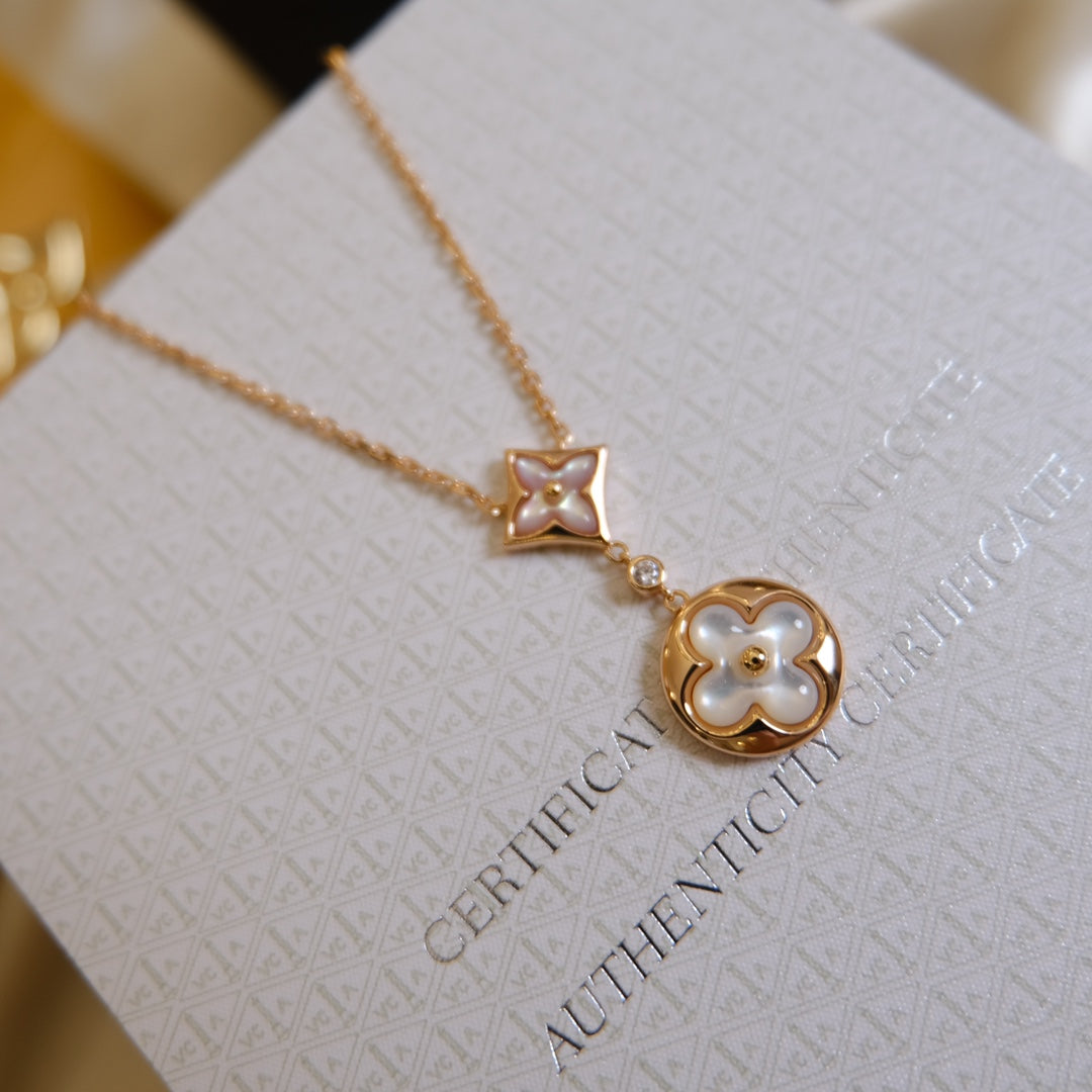 ˇGilded EraˇSTAR AND SUN WHITE MOP 2 MOTIF PINK GOLD NECKLACE