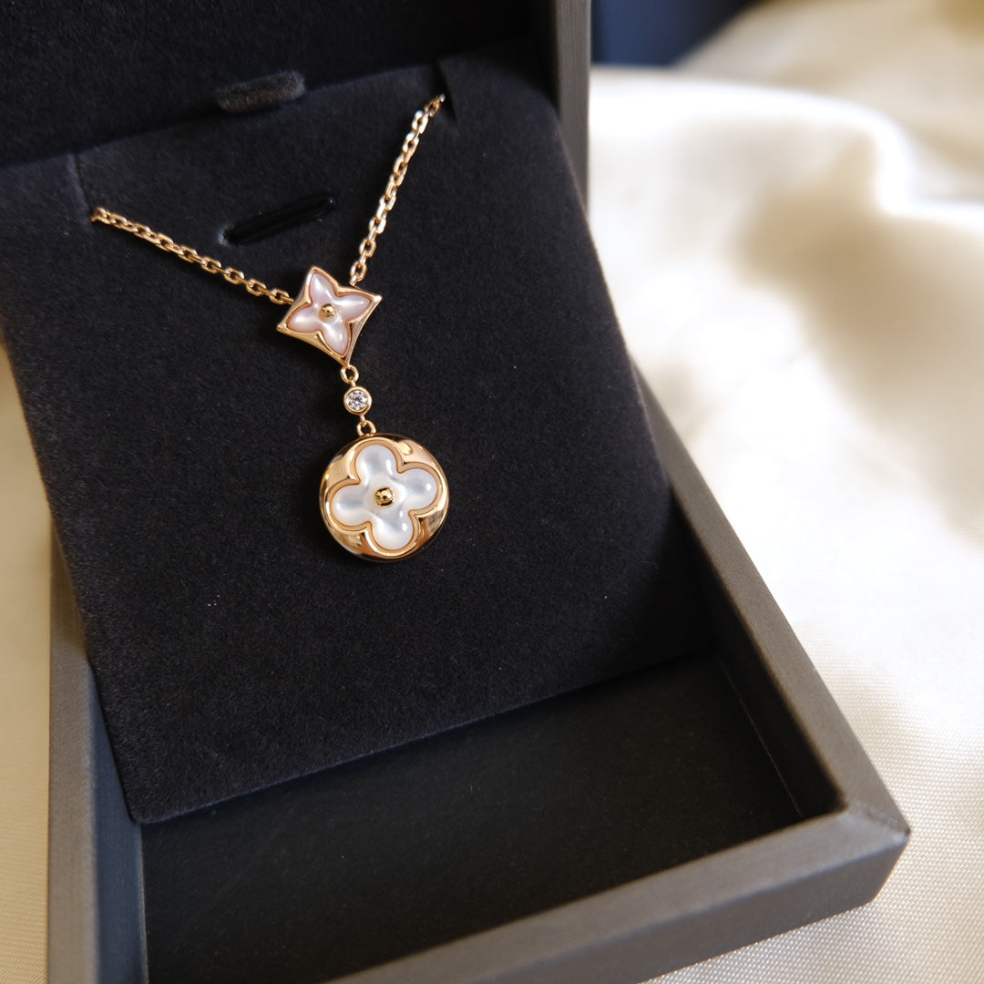 ˇGilded EraˇSTAR AND SUN WHITE MOP 2 MOTIF PINK GOLD NECKLACE