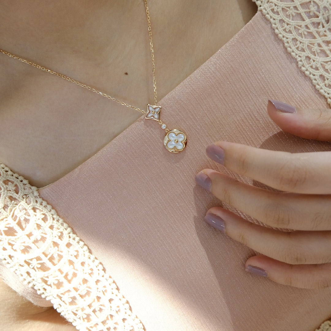 ˇGilded EraˇSTAR AND SUN WHITE MOP 2 MOTIF PINK GOLD NECKLACE