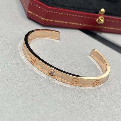 ˇGilded EraˇLOVE BRACELET 6.1MM 1 DIAMOND OPEN CUFF