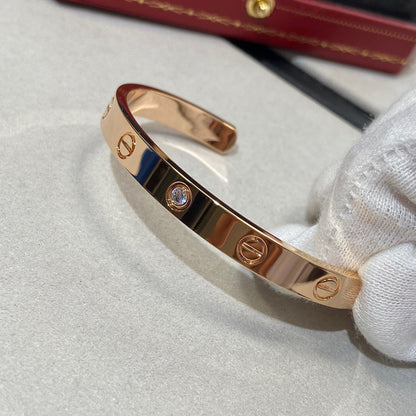 ˇGilded EraˇLOVE BRACELET 6.1MM 1 DIAMOND OPEN CUFF
