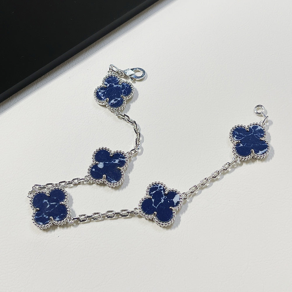 ˇGilded EraˇCLOVER 5 MOTIF PIETERSITE SILVER BRACELET