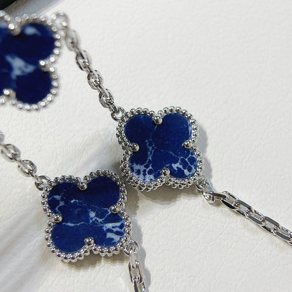 ˇGilded EraˇCLOVER 5 MOTIF PIETERSITE SILVER BRACELET