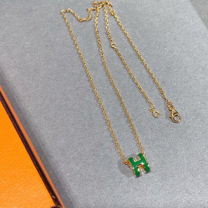 ˇGilded EraˇPOP H GREEN NECKLACE SILVER AND GOLD