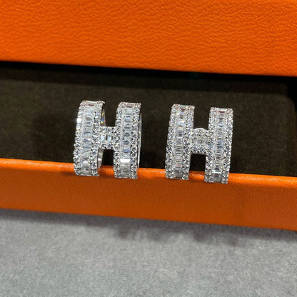 ˇGilded EraˇH STUD EARRINGS WITH SILVER DIAMONDS