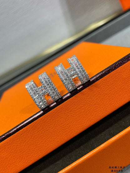 ˇGilded EraˇH STUD EARRINGS WITH SILVER DIAMONDS