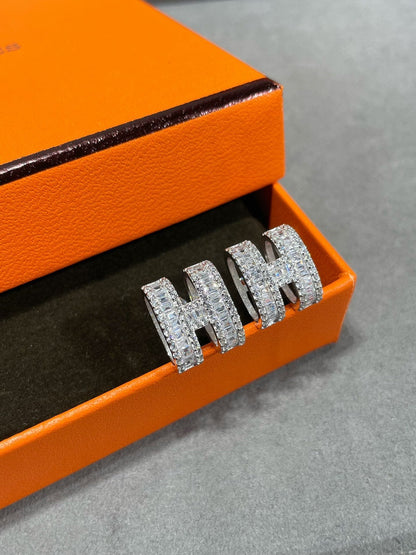 ˇGilded EraˇH STUD EARRINGS WITH SILVER DIAMONDS