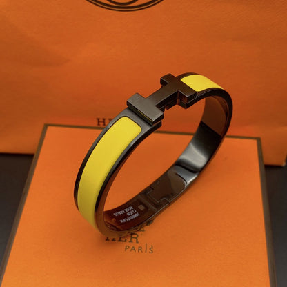 ˇGilded EraˇCLIC HM SO BLACK YELLOW BRACELET
