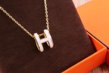 ˇGilded EraˇHM CLIC YELLOW ENAMEL GOLD NECKLACE