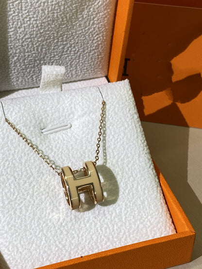 ˇGilded EraˇHM CLIC YELLOW ENAMEL GOLD NECKLACE