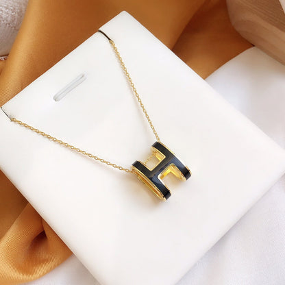 ˇGilded EraˇHM CLIC BLACK ENAMEL GOLD NECKLACE
