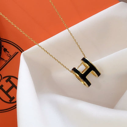 ˇGilded EraˇHM CLIC BLACK ENAMEL GOLD NECKLACE