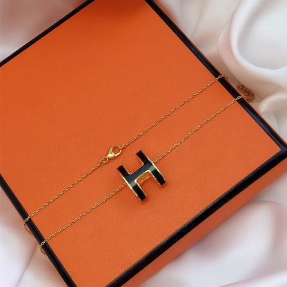ˇGilded EraˇHM CLIC BLACK ENAMEL GOLD NECKLACE