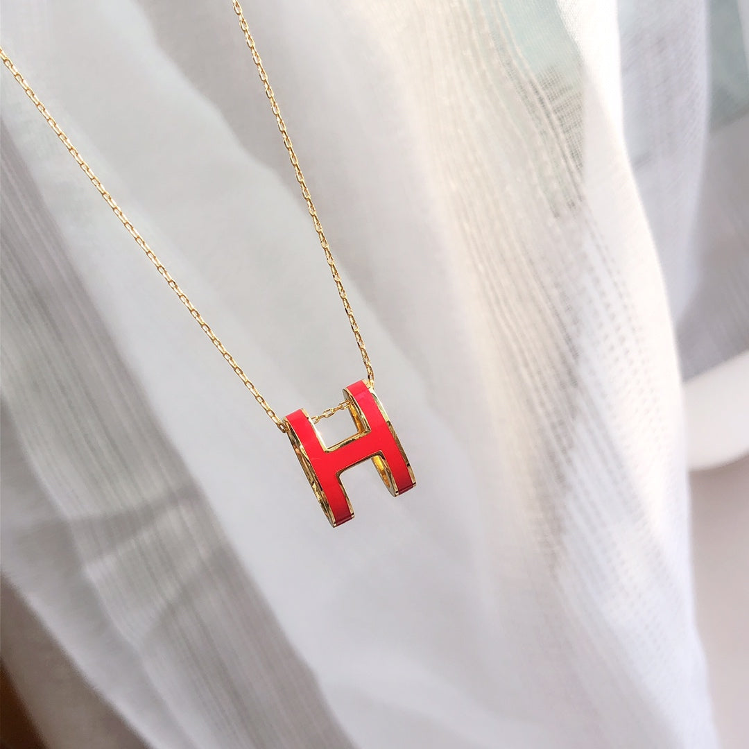 ˇGilded EraˇHM CLIC RED ENAMEL GOLD NECKLACE