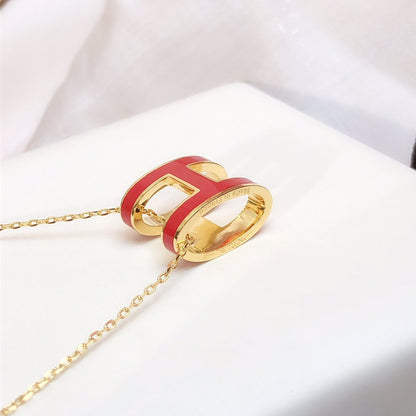 ˇGilded EraˇHM CLIC RED ENAMEL GOLD NECKLACE