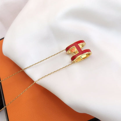 ˇGilded EraˇHM CLIC RED ENAMEL GOLD NECKLACE